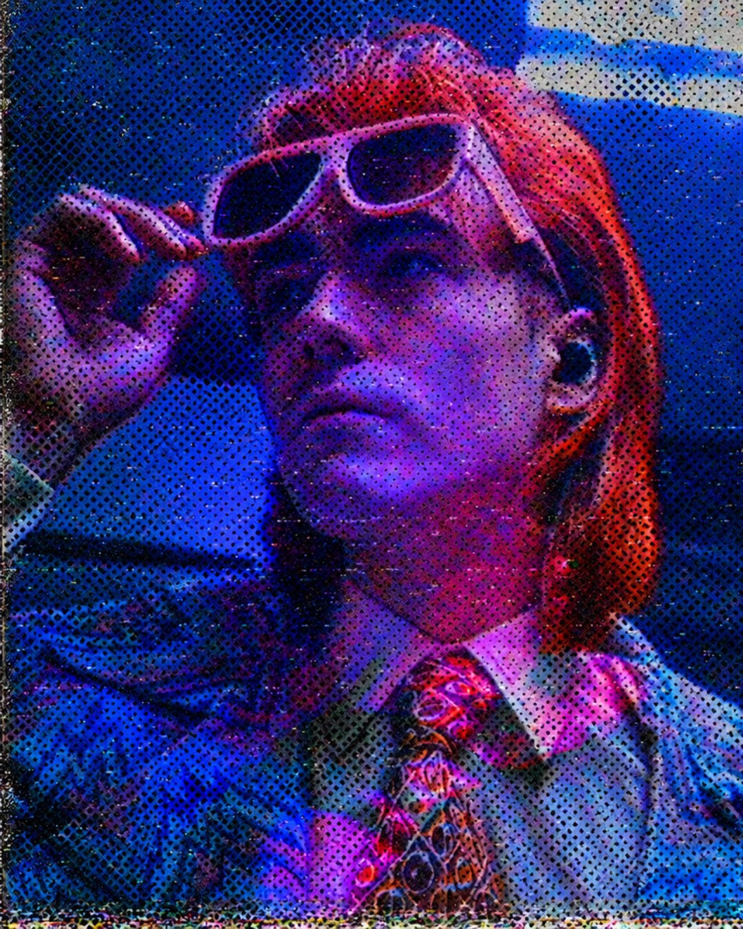 Retrato tramado de Gaspar Luna levantándose las gafas, en rojo y azul
